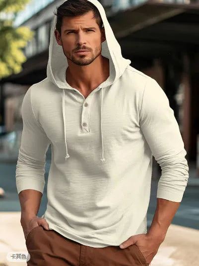 Man wearing a dark blue cotton pullover hoodie top with long sleeves, showing loose casual fit.