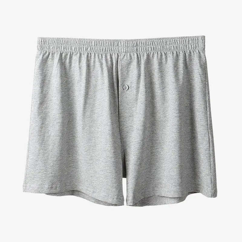 Men's solid colour cotton boxer shorts with a high waistband and loose leg.