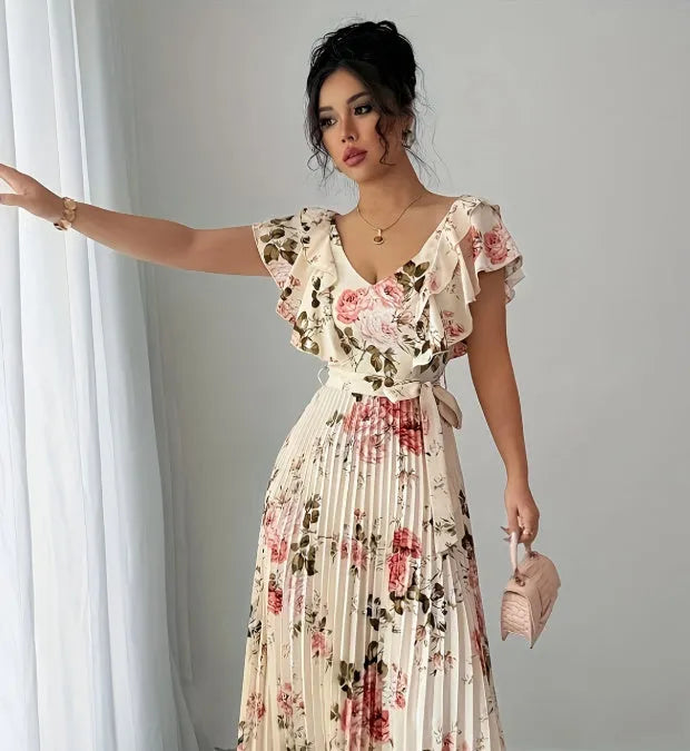 Apricot floral print V-neck dress with ruffled sleeves and oversized swing skirt on hanger