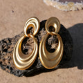 Quicksand gold-toned women's earrings with a U-shape and double ring design in a French retro style.