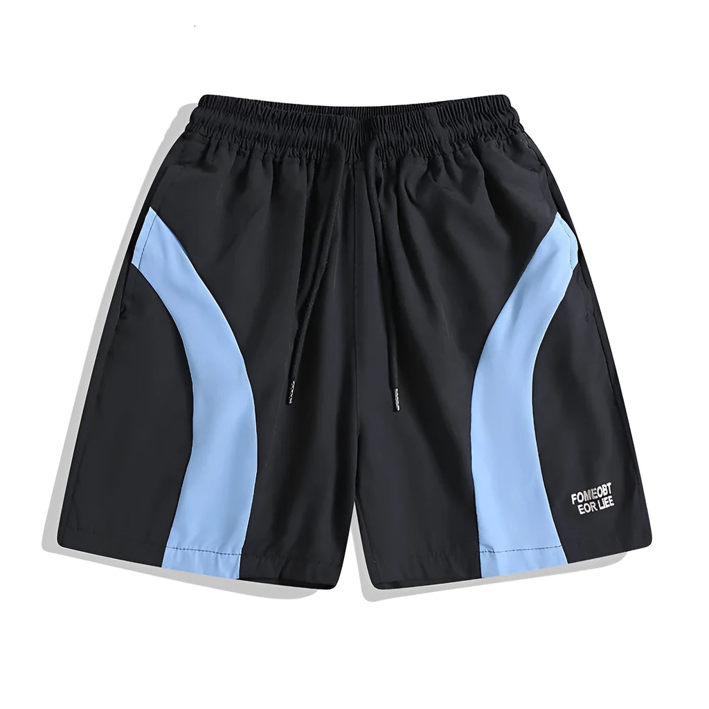 Black loose-fit quick-dry sports shorts with an elastic waistband on a manikin.
