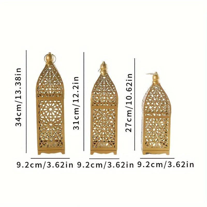 Gold L decorative iron barn lantern with hollow four-corner design on a tabletop
