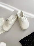 Flat buckle casual sneakers in creamy-white with round toe and PU leather upper.