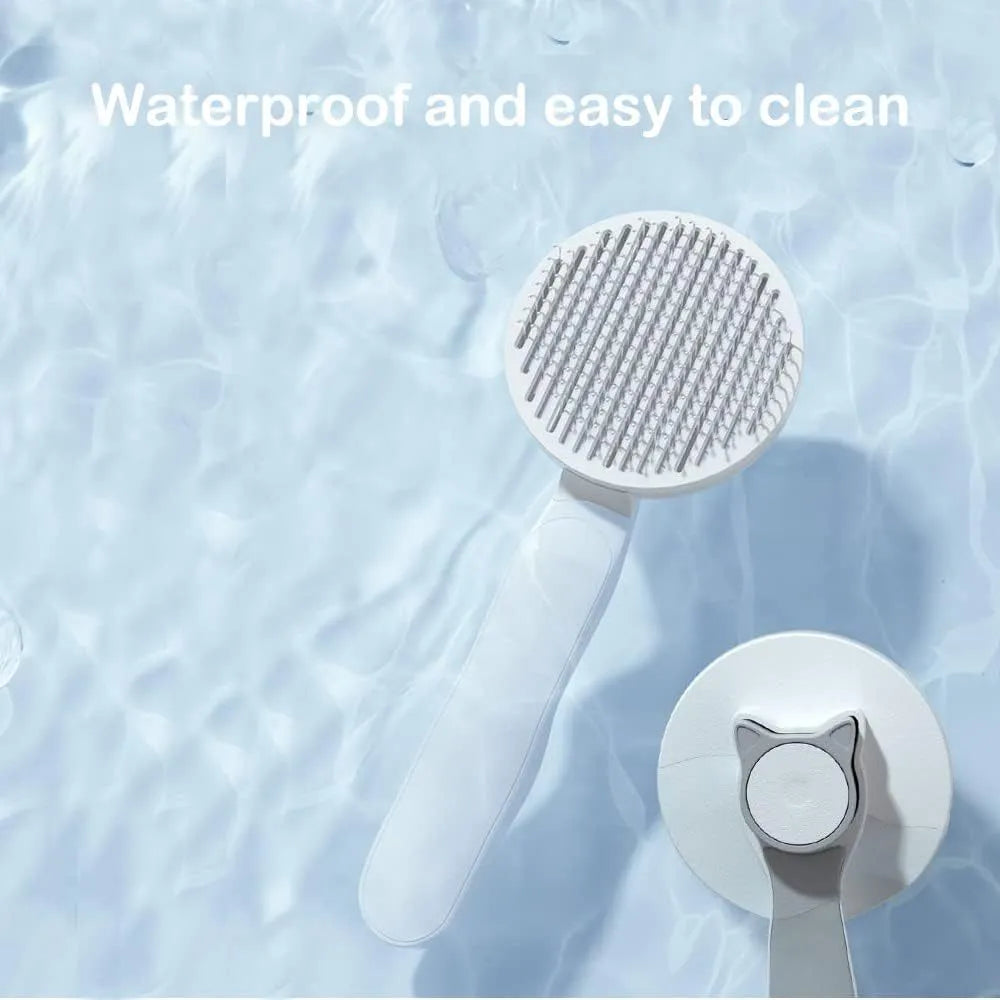 Blue self-cleaning cat grooming brush with rubber-tipped needles and a non-slip handle.