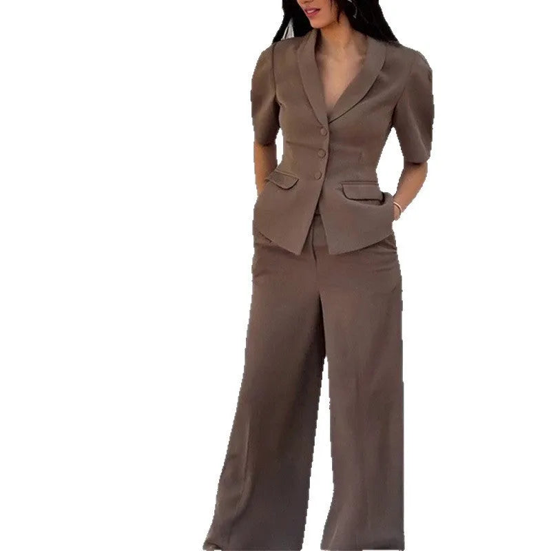 Brown polyester slim fit waist top and trousers suit set with long sleeves on mannequin