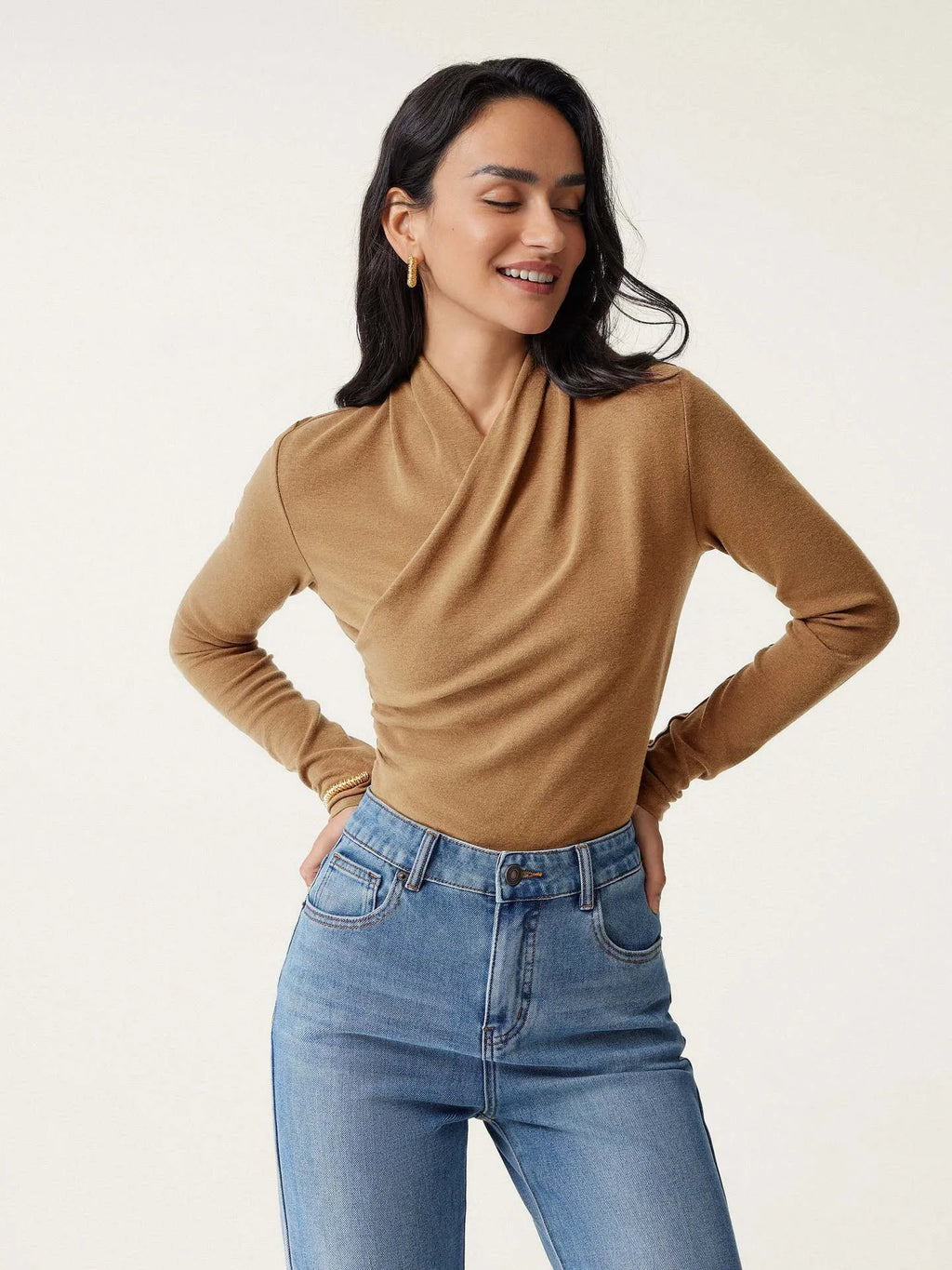 Women's camel colour slim fit pullover sweater with long sleeves on hanger