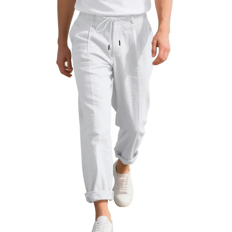 Men's light khaki linen casual trousers with a loose straight-leg fit and drawstring waist.