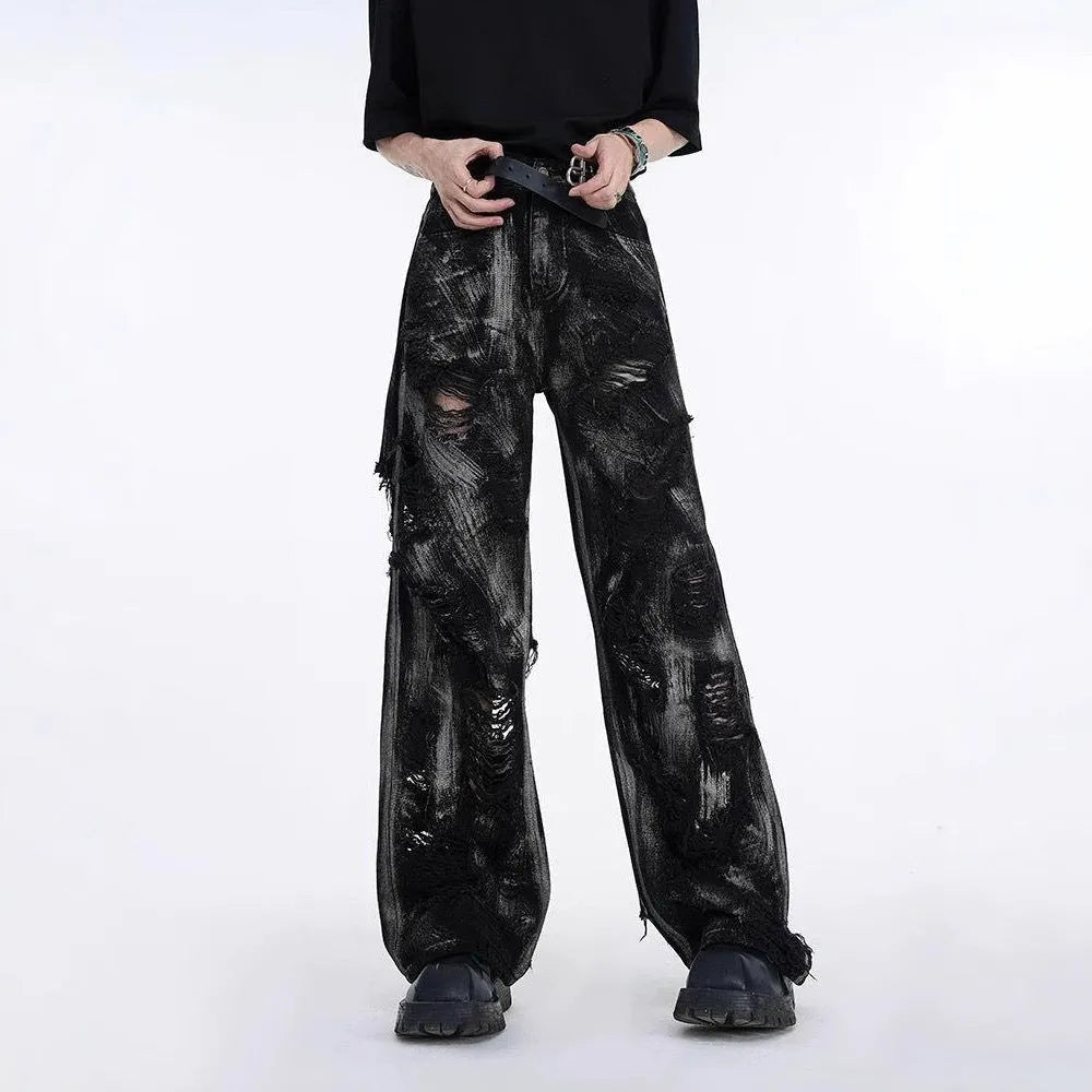Men's heavyweight washed denim trousers showing mid-waist design and zipper fly detail