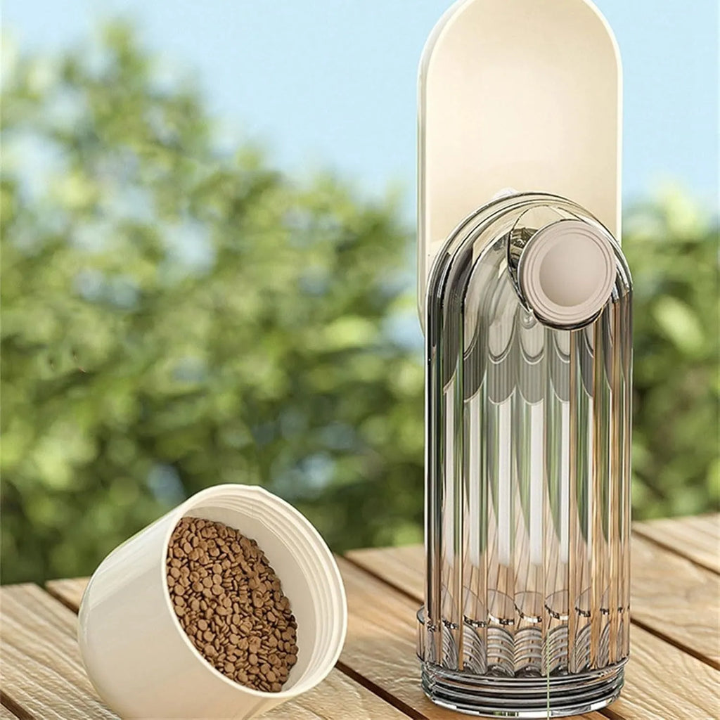 Beige foldable dog water bottle with integrated food container, shown with press-button tray.