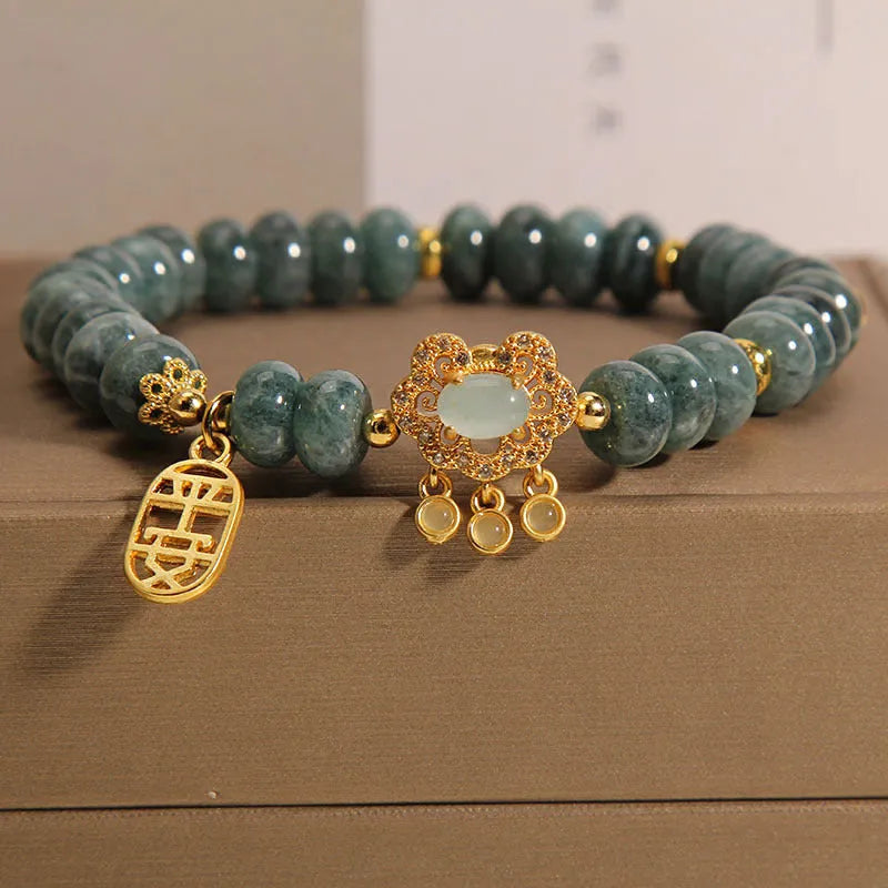 Women's natural emerald jade bracelet with abacus bead design and alloy safety lock closure