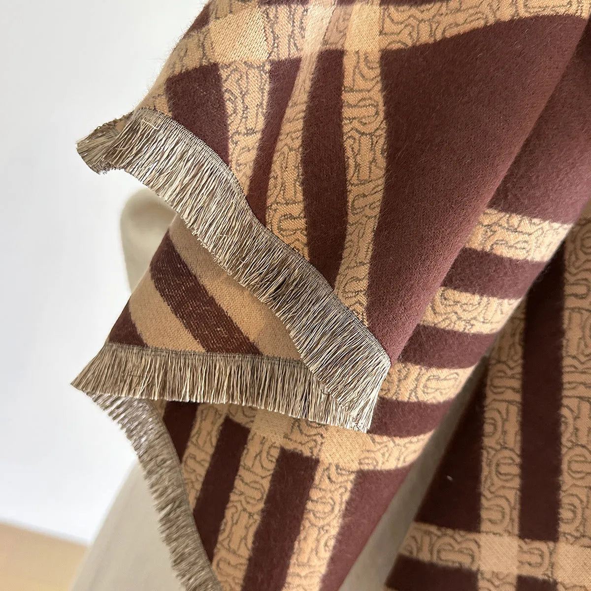 Imitation cashmere scarf with tassels in brown colour showing 185cm length