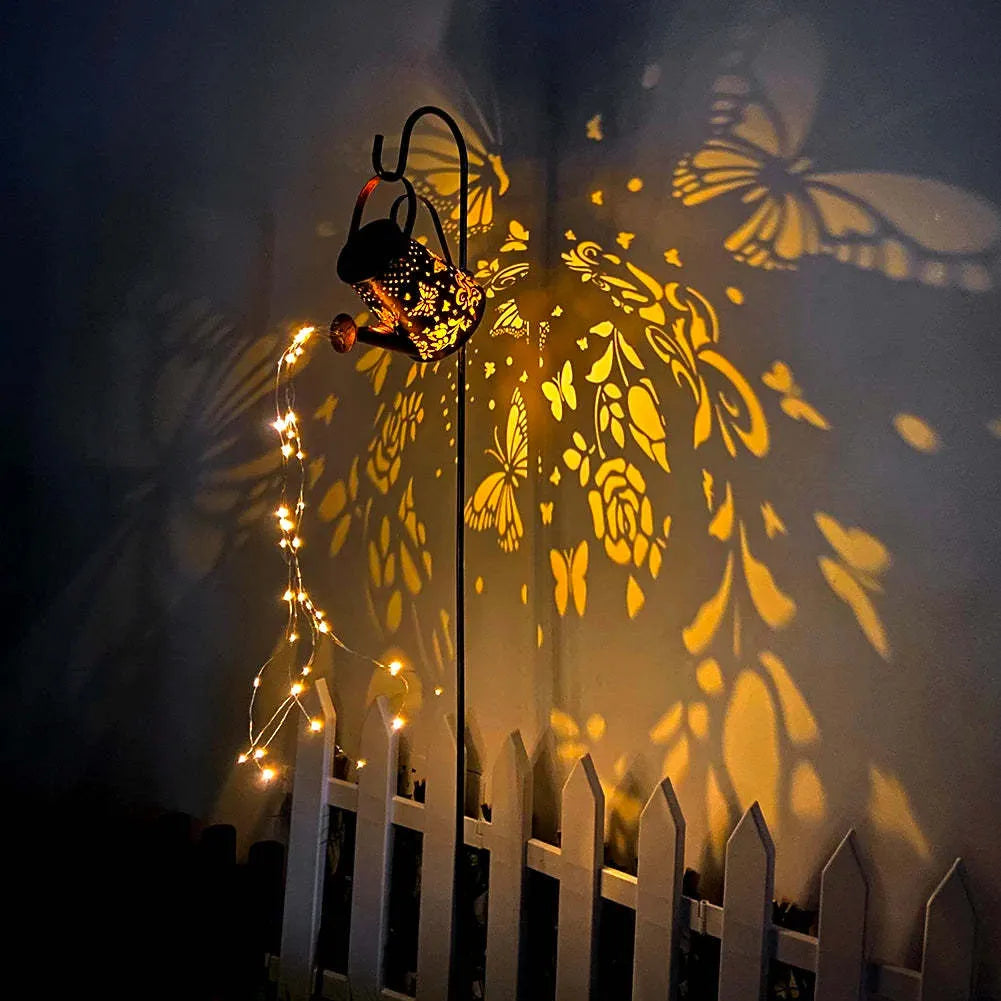 Solar garden lamp with butterfly pattern design and iron construction for outdoor lighting
