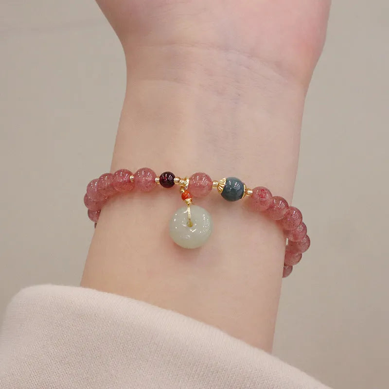 Strawberry quartz women's bracelet with geometric stone pattern and purse charm pendant