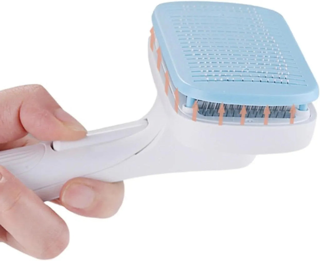 Blue automatic pet hair removal comb with a one-click button, shown on a grey background.