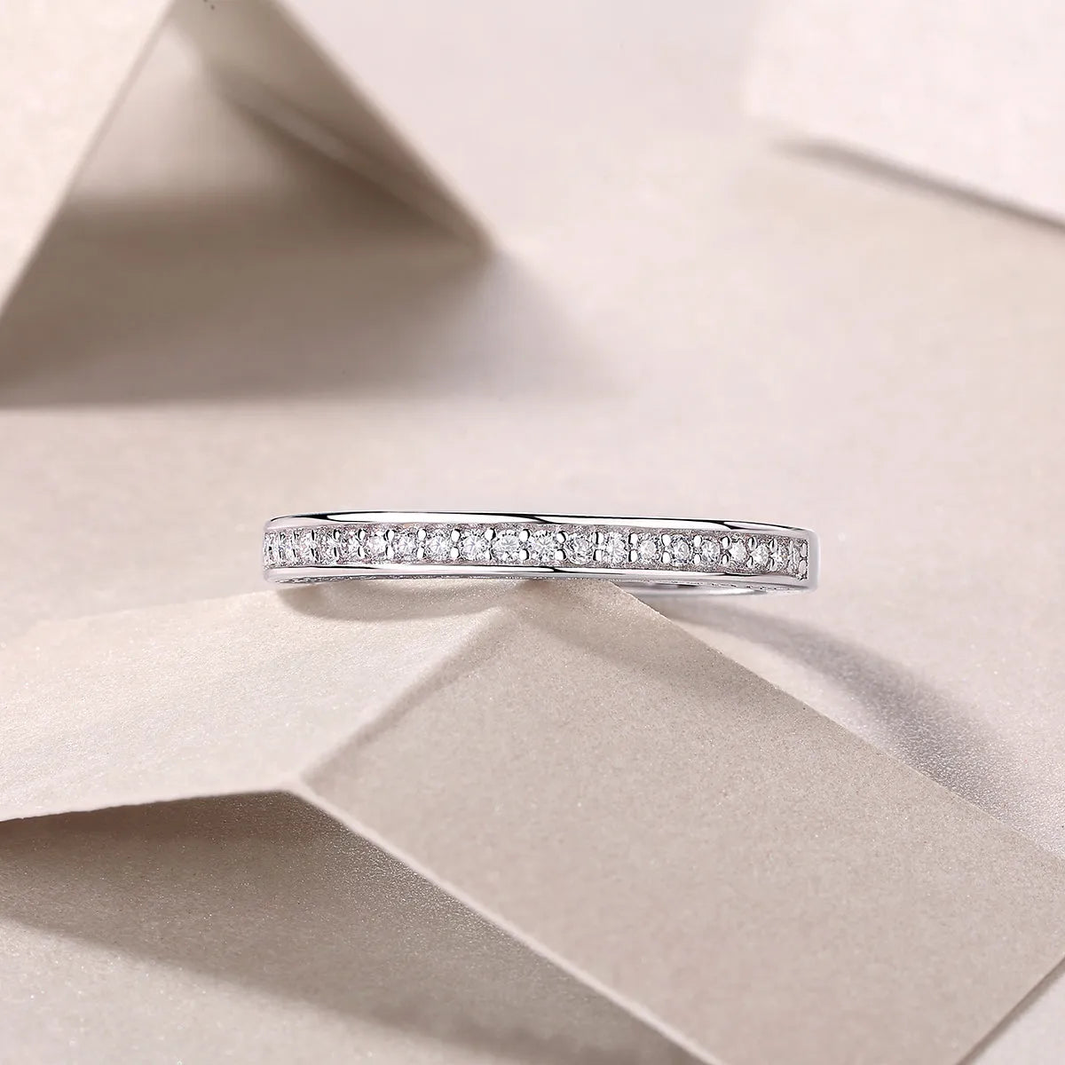 The Plucked Star moissanite wedding ring set in S925 silver with platinum plating, available in multiple colours