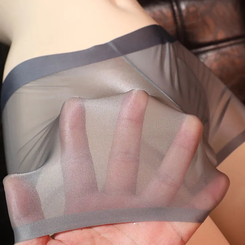 Men's ultra-thin transparent ice silk boxer underwear in light grey colour showing lightweight fabric texture
