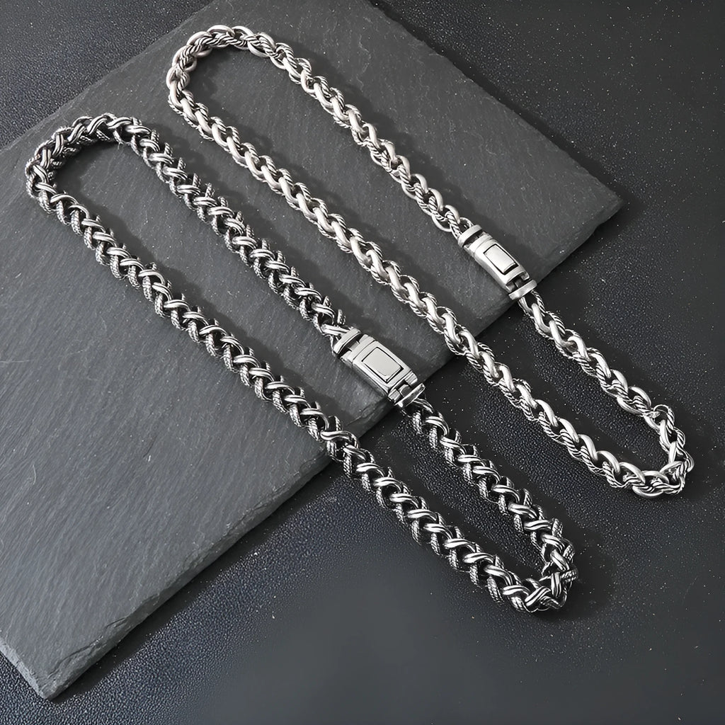 Men's titanium steel keel chain necklace showing vintage design with large hemp flower elements in antique silver finish