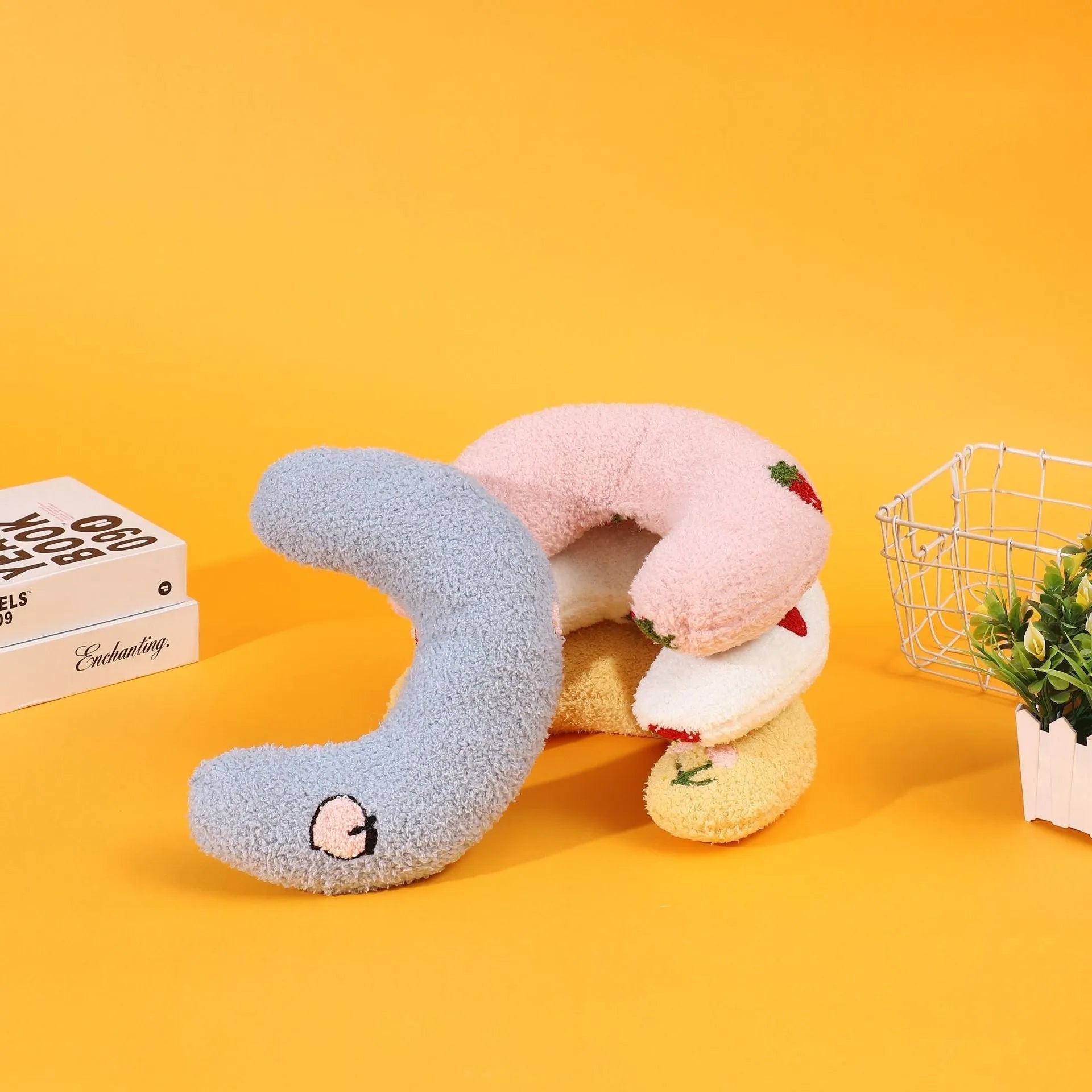 Half moon shaped U-design pet pillow for dogs and cats in blue, pink, white, or yellow colours