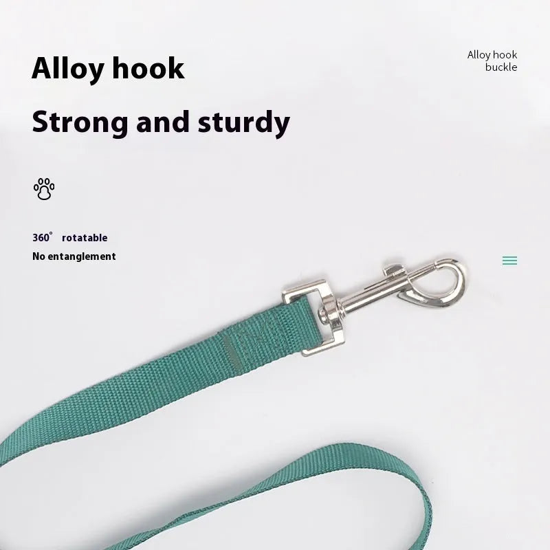 Solid colour polyester dog walking rope held in a hand, showing one of twelve colour options and its simple rope design.