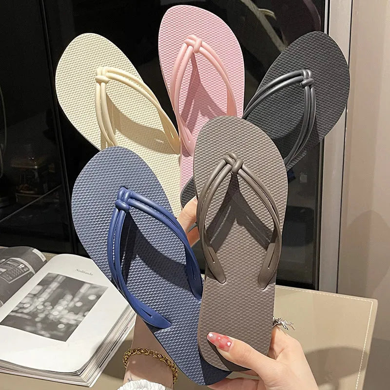 Women's casual PVC flip flops with toe covering style and injection moulded non-slip sole in multiple colour options.