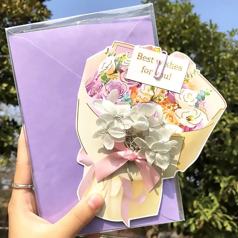 Handmade 3D butterfly-shaped birthday card with artificial flowers and hot foil stamping details.