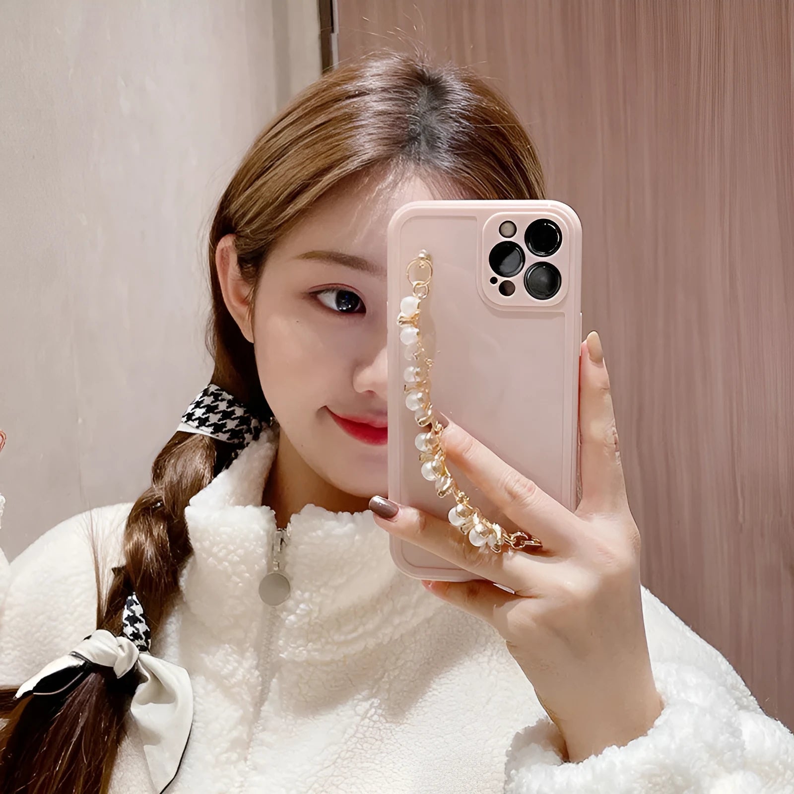 Silicone phone case with rhinestone pearl bracelet for iPhone Pro Max in pink and white options