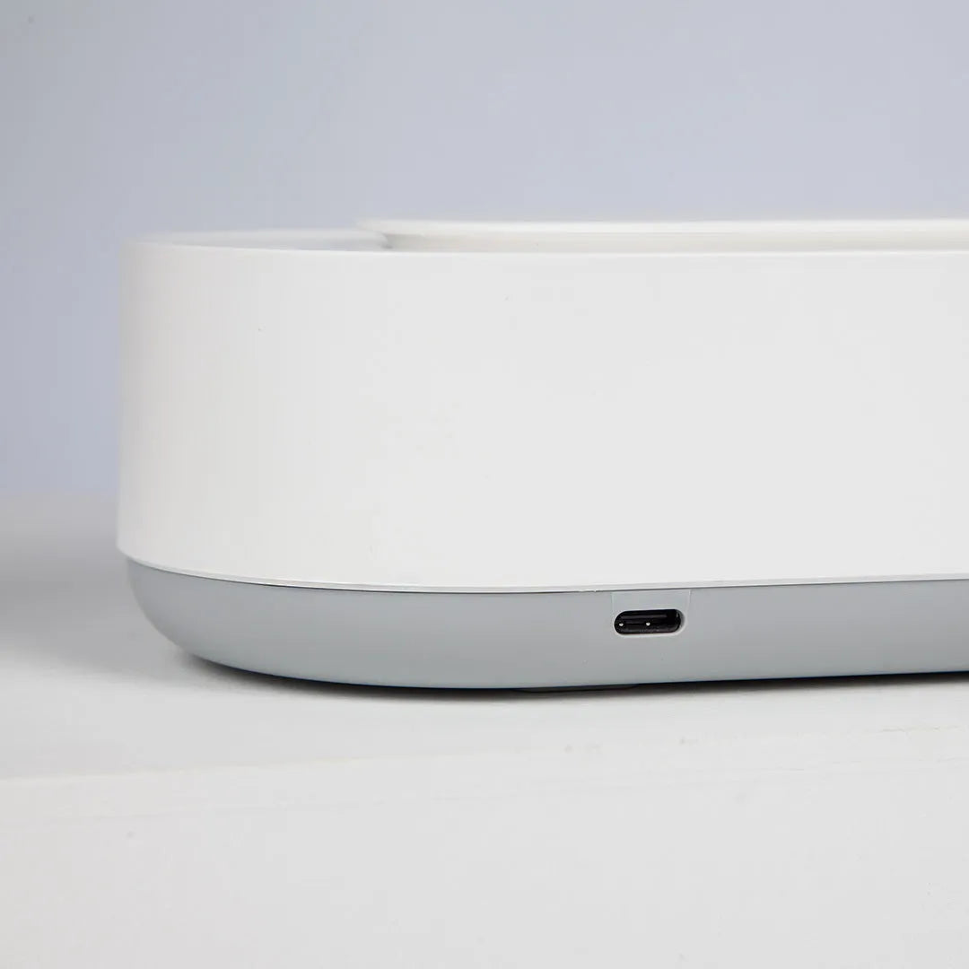 White portable ultrasonic cleaning machine with stainless steel tank for jewellery and glasses.