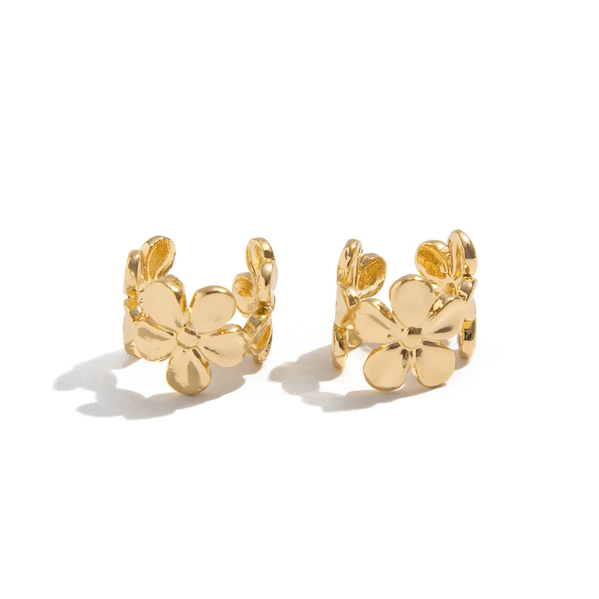 Women's gold starfish conch earrings with beach animal design on alloy material