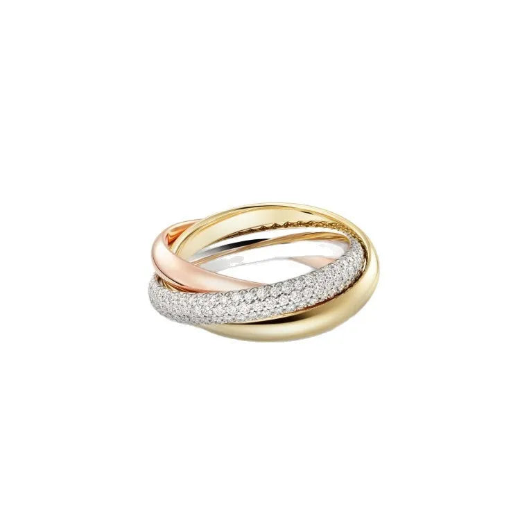 Set of three geometric U-shaped silver couple rings with diamond accents on a grey background.