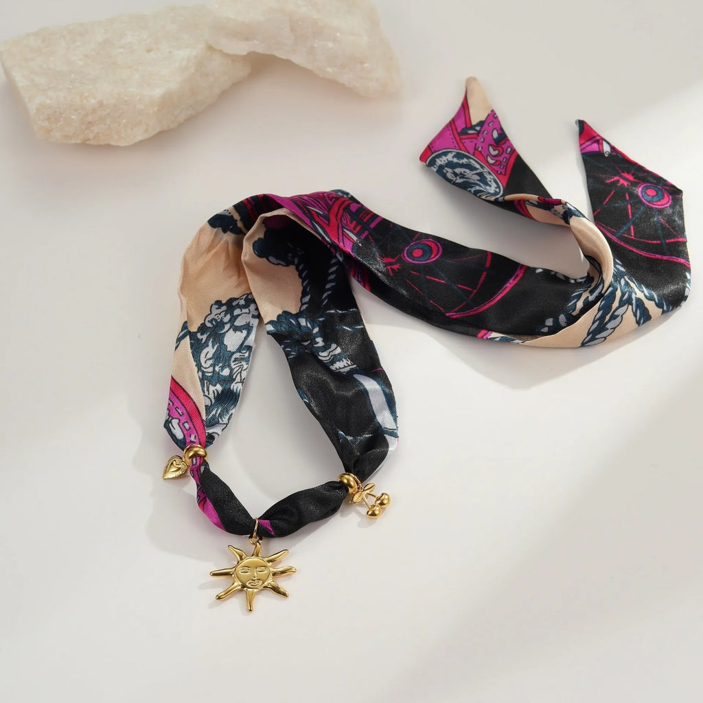 Women's geometric pendant necklace with gold chain and matching bracelet for autumn winter fashion