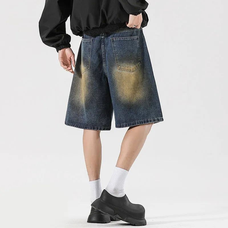 Retro blue loose fit ripped jeans with distressed detailing and street style design