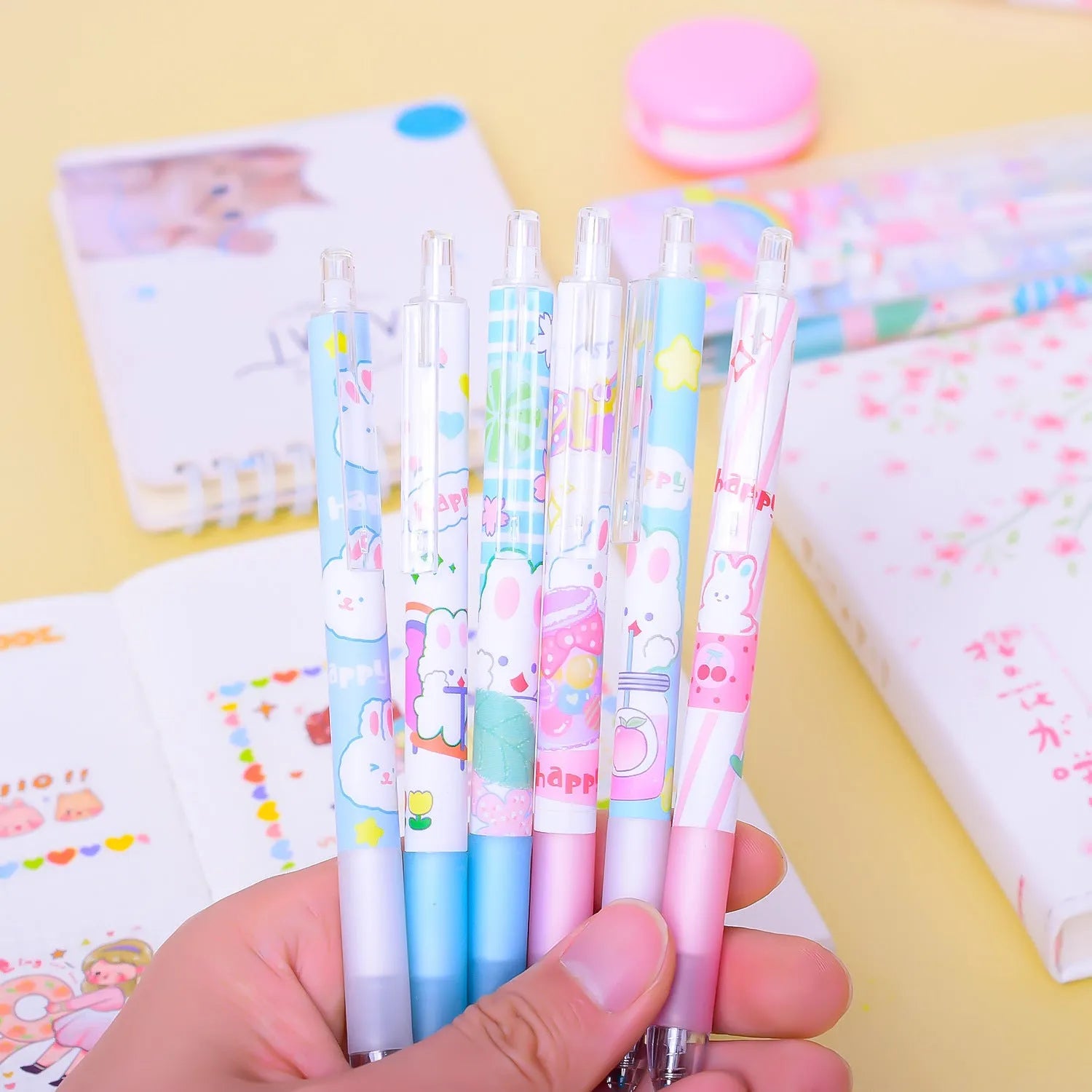 Six cartoon bunny design gel pens with 0.5mm tips and black ink displayed together