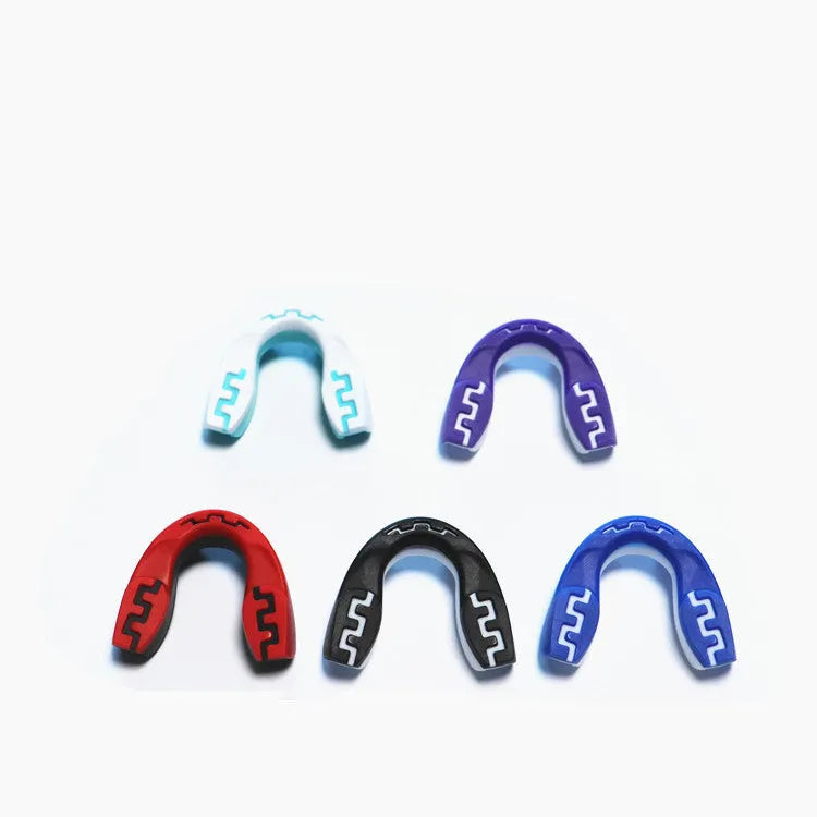 Adult boxing mouthguard with tooth socket design and printed teeth pattern in three colour options