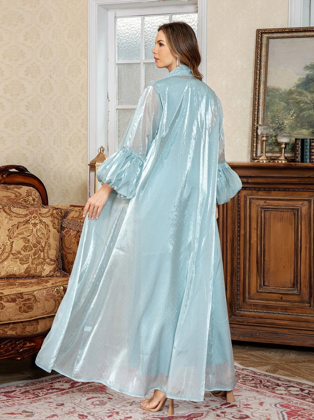 Arabic style two-piece set dress with rhinestone detailing in blue colour, showing long sleeves and long skirt
