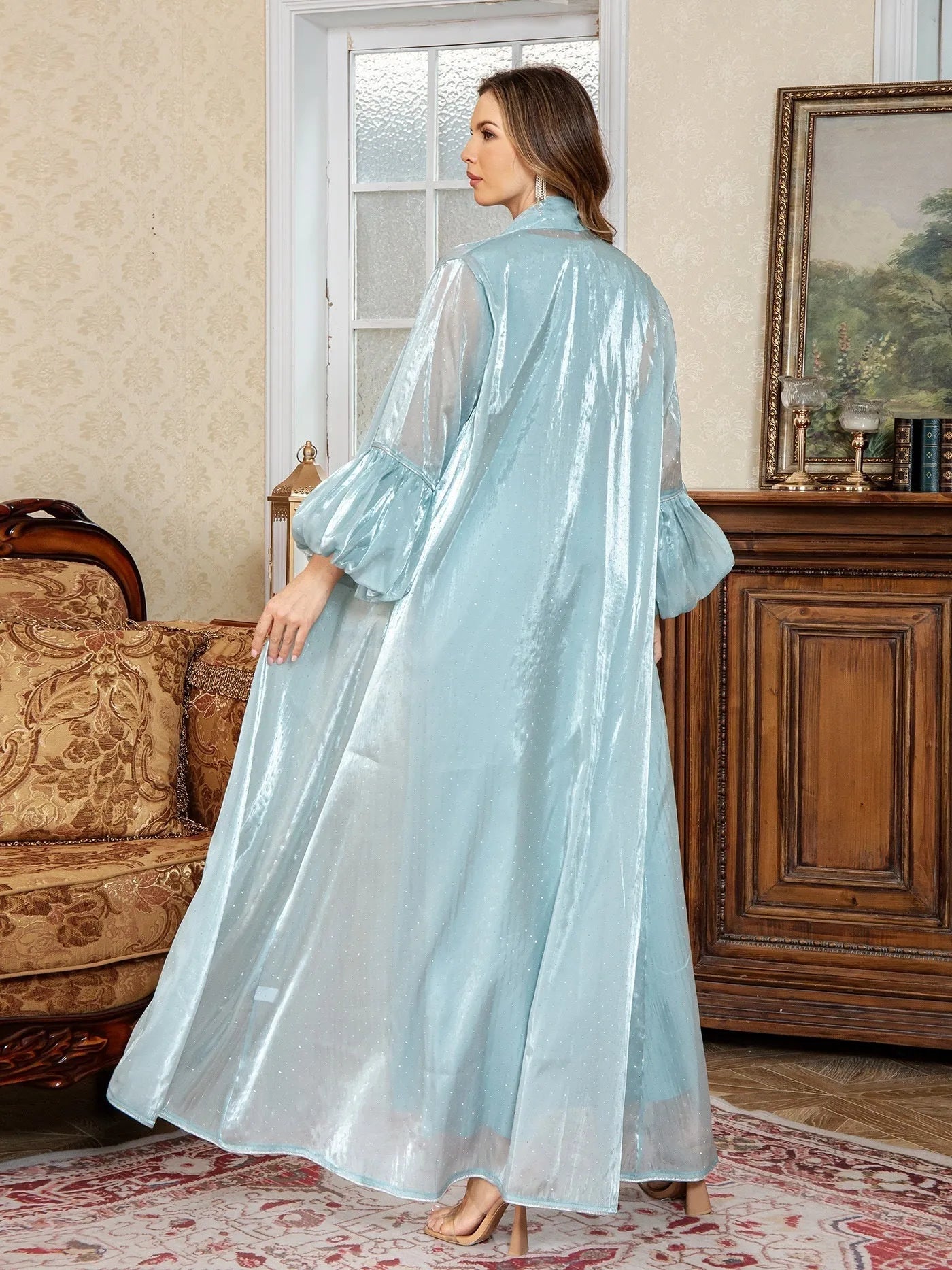 Arabic style two-piece set dress with rhinestone detailing in blue colour, showing long sleeves and long skirt
