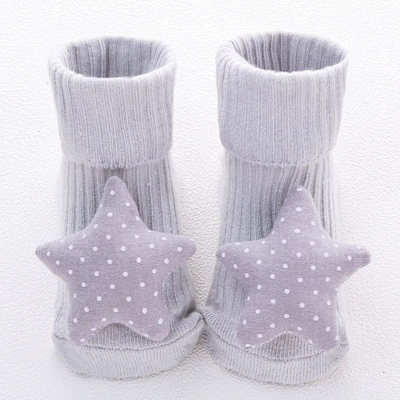 Cotton baby floor socks in blue bow pattern for infants 0-3 months.