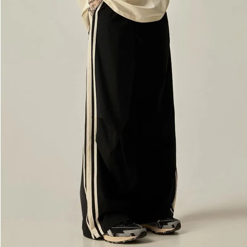 Black men's wide-leg climbing pants with high-waist design and straight silhouette