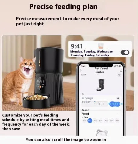 Black automatic pet feeder with digital display and food container on kitchen counter