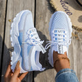 Women's Flyknit mesh lace-up sneakers in various colours with low flat heel and rubber sole