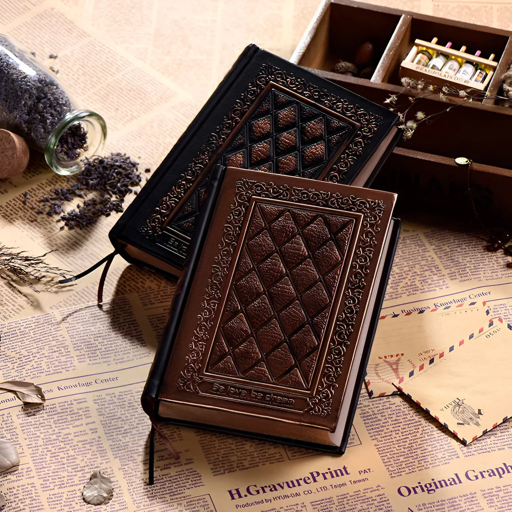 Embossed faux leather notepad with three-dimensional cover design in bronze colour