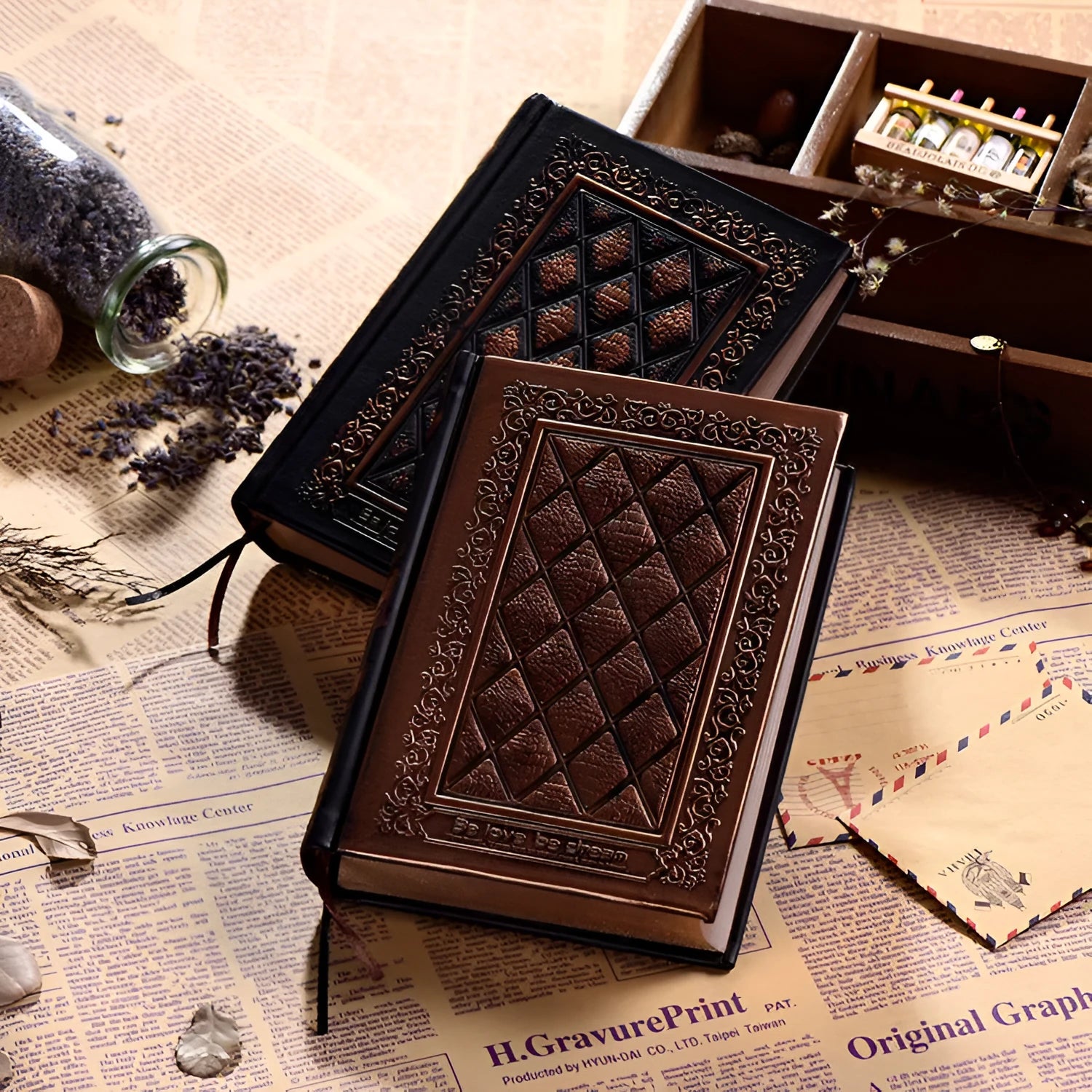 Embossed faux leather notepad with three-dimensional cover design in bronze colour