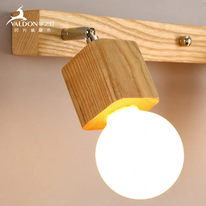 24cm single-head mirror cabinet LED wall lamp on a white wall