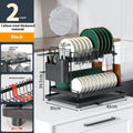 White double-layer kitchen draining rack with removable storage compartments on countertop