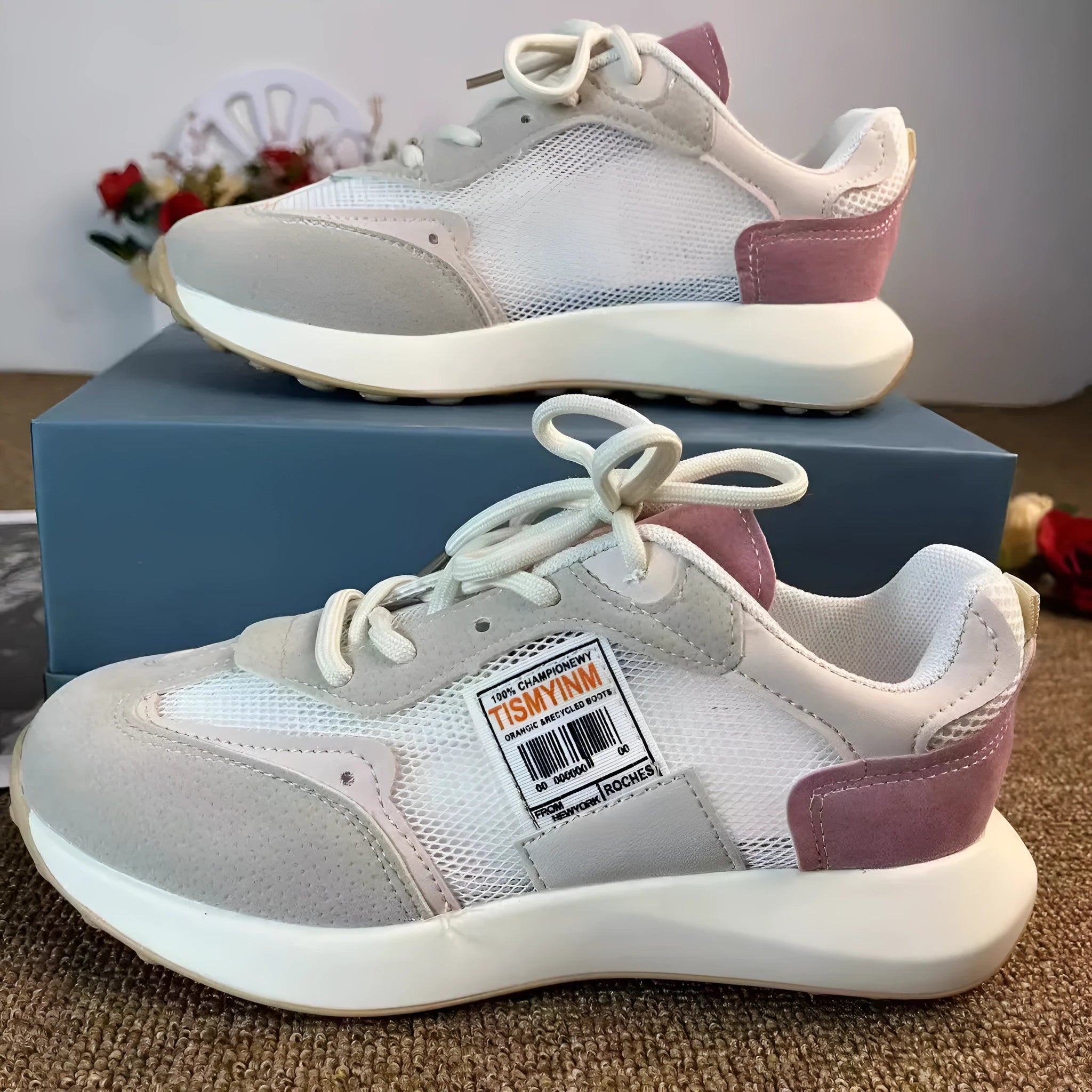 Women's low-top retro sneaker in grey with round toe, rubber sole, and shallow-cut design under 7cm.