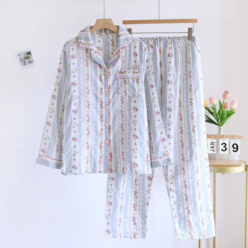 Women's cotton gauze pyjama set with long sleeves and trousers in a colour stripes or fruit print pattern.