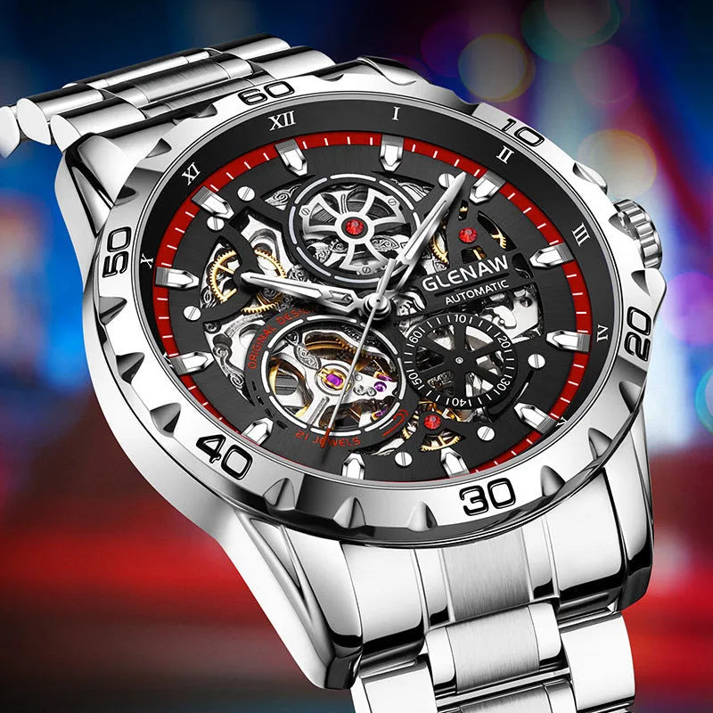 Silver men's automatic watch with hollow-out dial, luminous hands, and stainless steel strap.