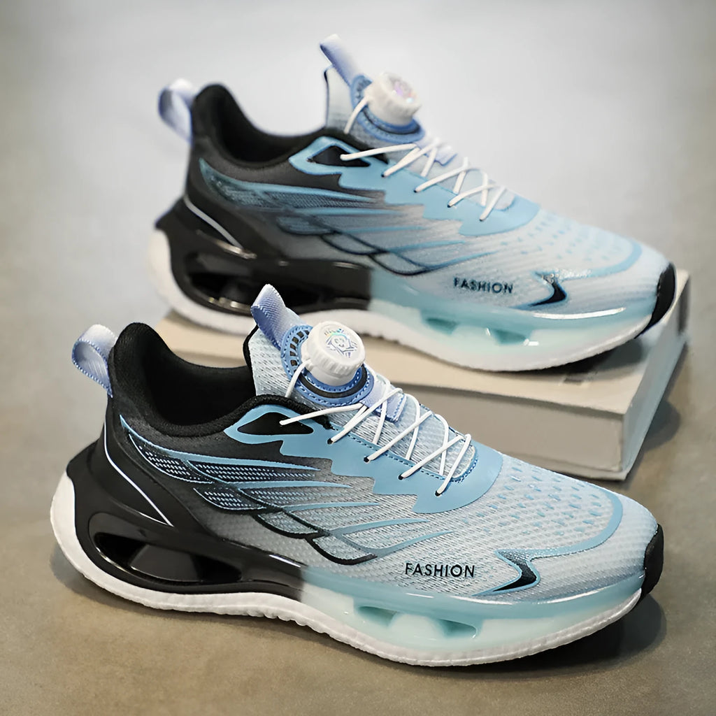 Low-top men's sneaker with rotating button, mesh upper, and solid rubber sole in light blue.