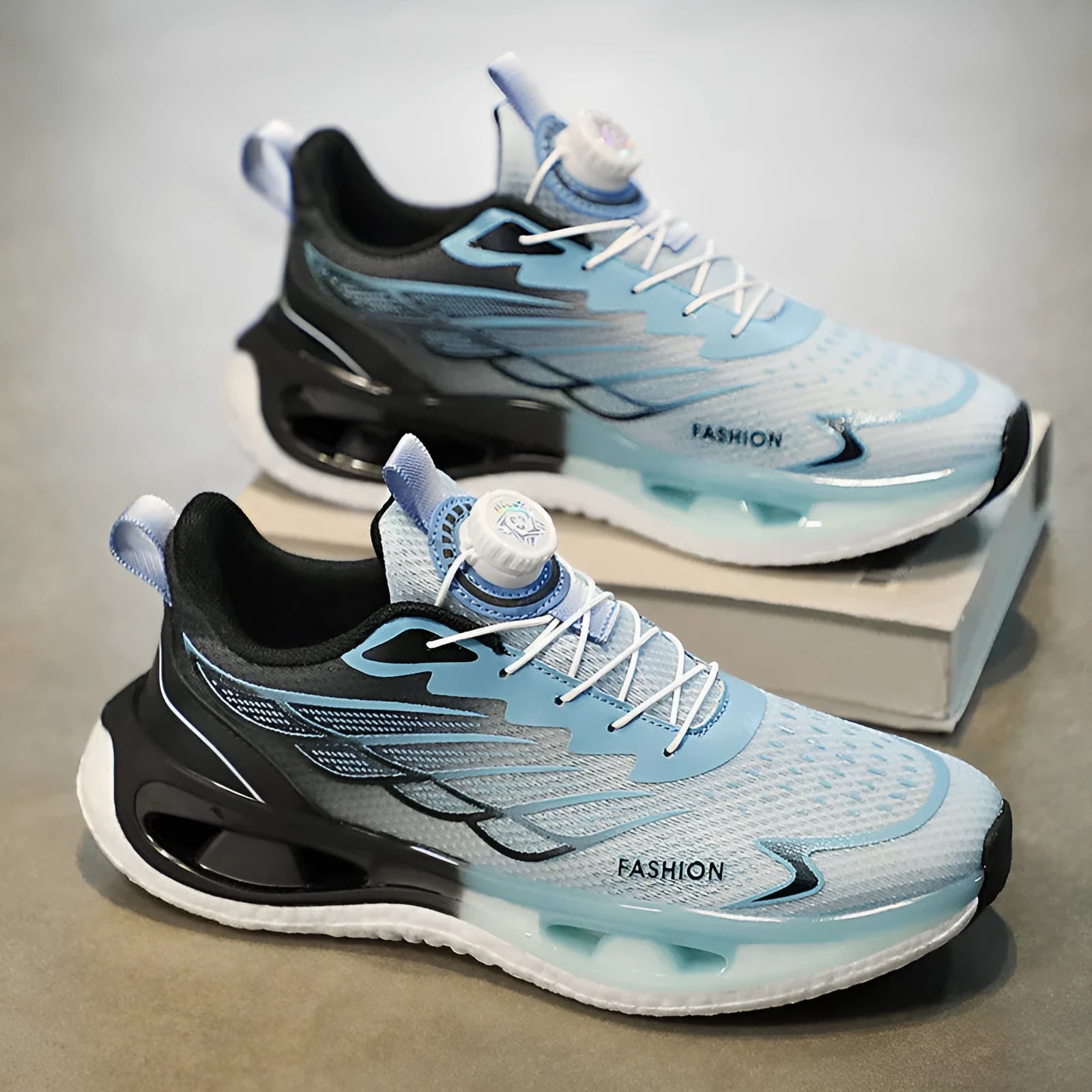 Low-top men's sneaker with rotating button, mesh upper, and solid rubber sole in light blue.