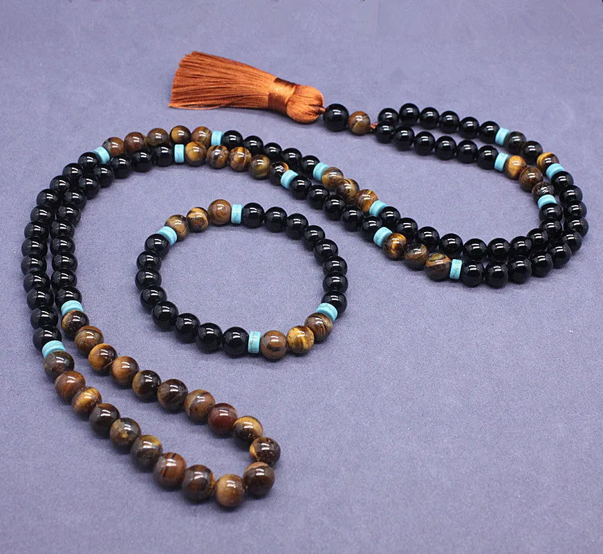 Black agate jewellery set showing tiger-eye stone necklace and geometry bead bracelet