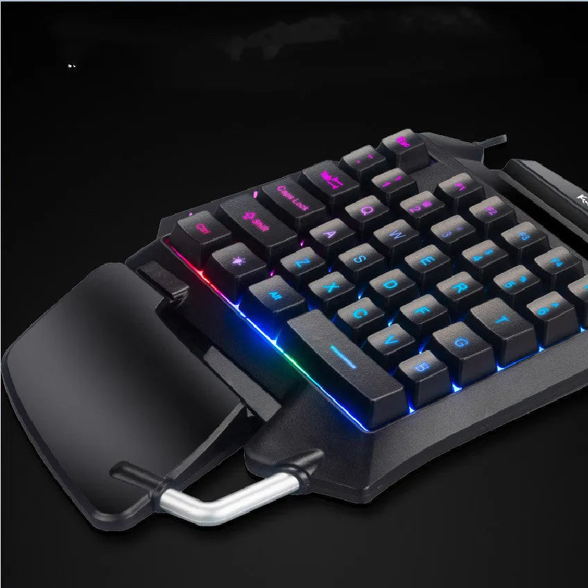 Black one-handed left-handed gaming keyboard with USB cable and integrated hand rest for mobile gaming